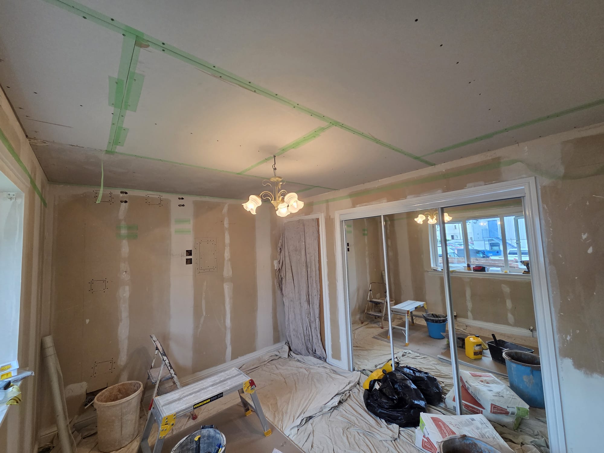 Beefore picture of plastered bedroom